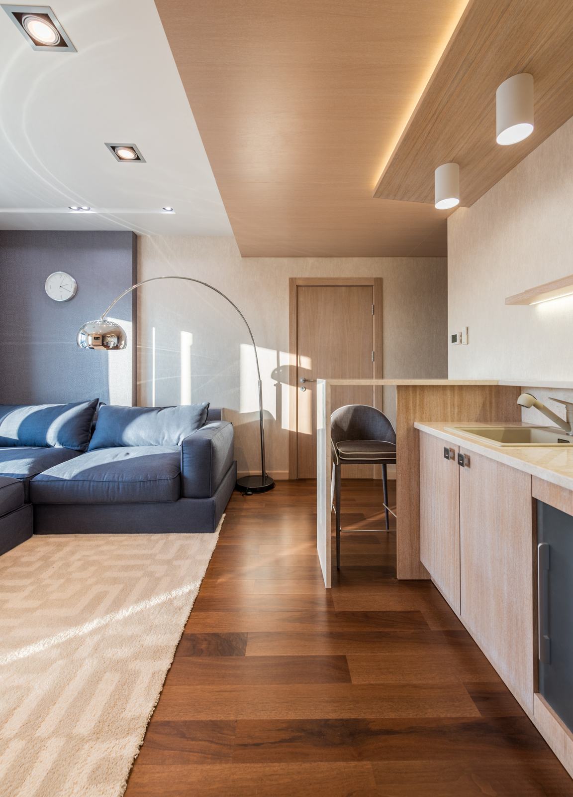 Bright modern living room with kitchen